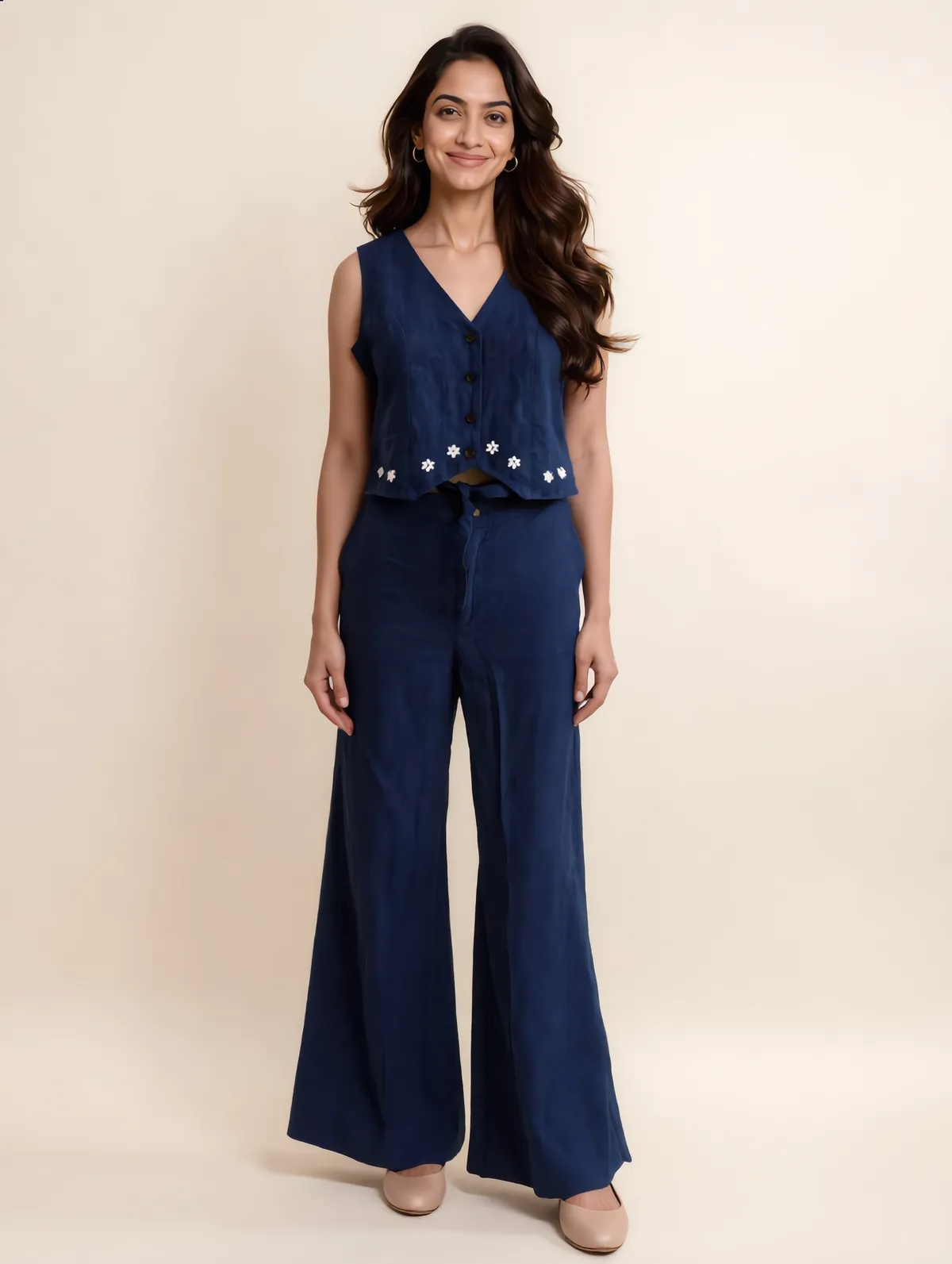 Navy linen vest and wide-leg trouser co-ord with daisy embroidery at the hem
